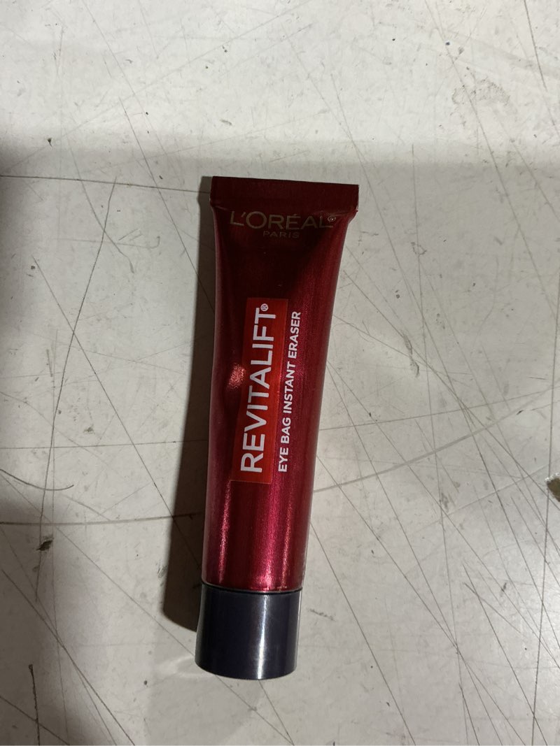 Condition photo showing As Is for l'oreal paris revitalift triple power eye bag instant eraser, eye tightener treatment to firm bags, 0.5 oz + sample
