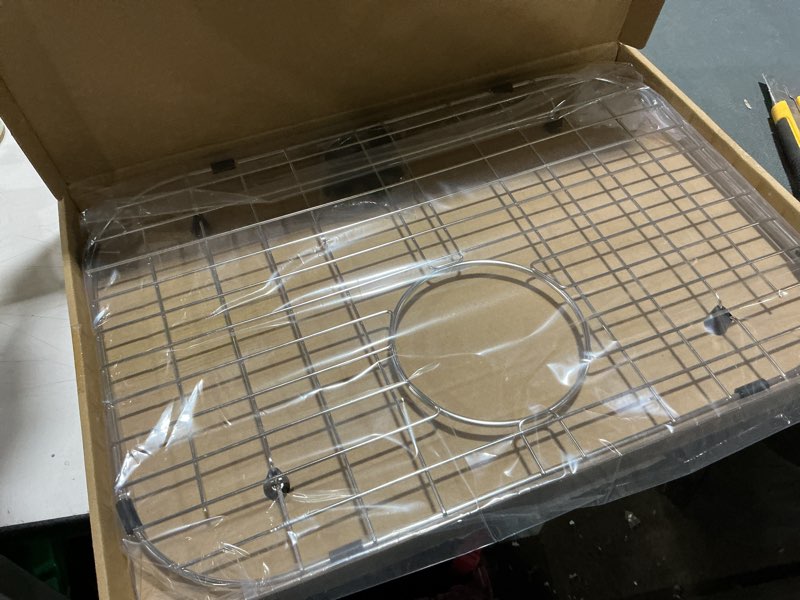 Condition photo showing New/Like New for serene valley sink bottom grid 19-1/16" x 13-5/8”, rear drain with corner radius 3-1/2", sink protector nlw1914r