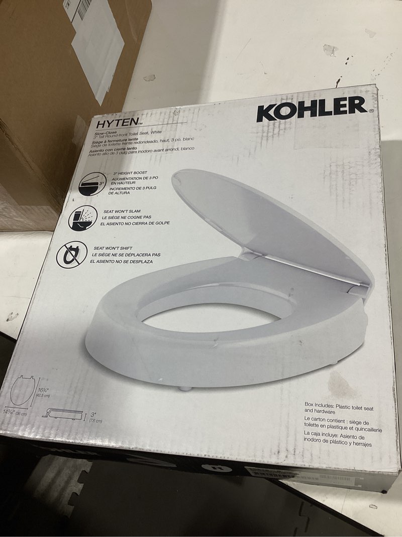 Condition photo showing Good Condition for kohler 25876-0 hyten 3" height, elevated soft close round toilet seat, contoured seat with grip-tight bumpers, quick-attach hardware, white white round