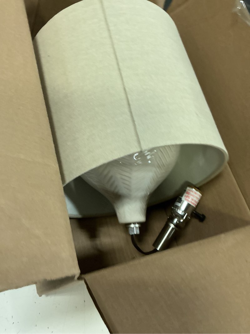 Condition photo showing Good Condition for signature design by ashley rainermen casual ceramic table lamp, transparent white glaze finish, drum hardback fabric shade, 11" w x 11" d x 21" h, off white off-white