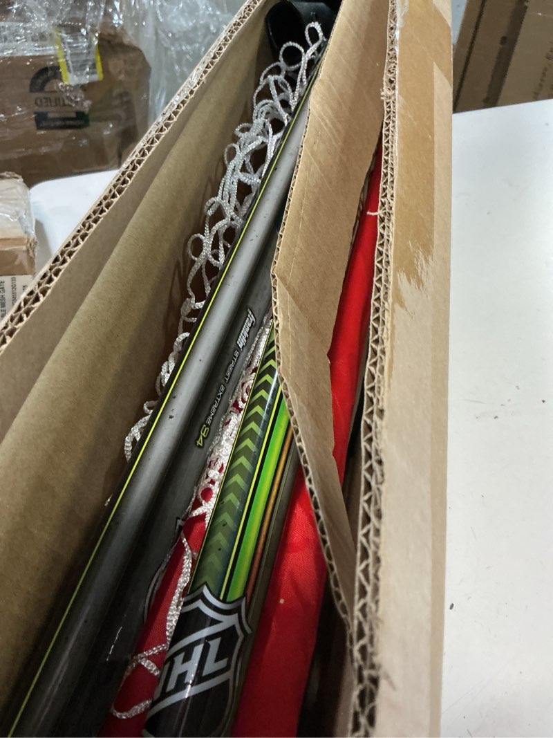 Condition photo showing Good Condition for franklin sports nhl goal and 2 stick set
