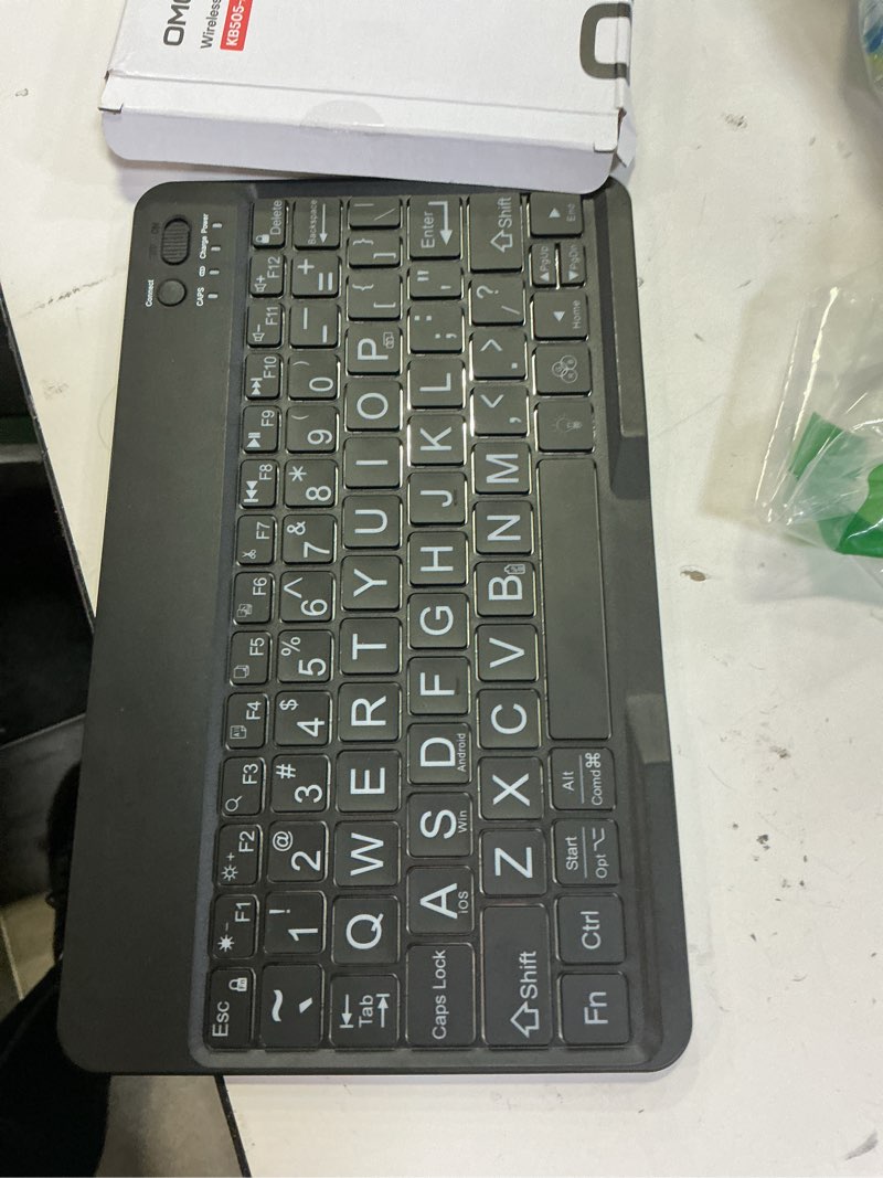 Condition photo showing As Is for OMOTON Large Print Bluetooth Keyboard for iPad iPhone Windows Tablets - 7 - Color Backlit with Enlarged Keycaps, Rechargeable Wireless Keyboard for iPad 10th/9/8/7, iPad Pro Air Mini etc Largeprints Keycaps-Black-US