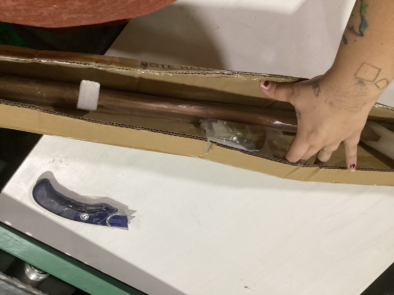 Condition photo showing As Is for brown wood grain disc curtain rods, 48-84 inches window curtain rod,adjustable room darkening drapery rod with aluminum finials and brackets,wrap around design 48-84" brown wood grain
