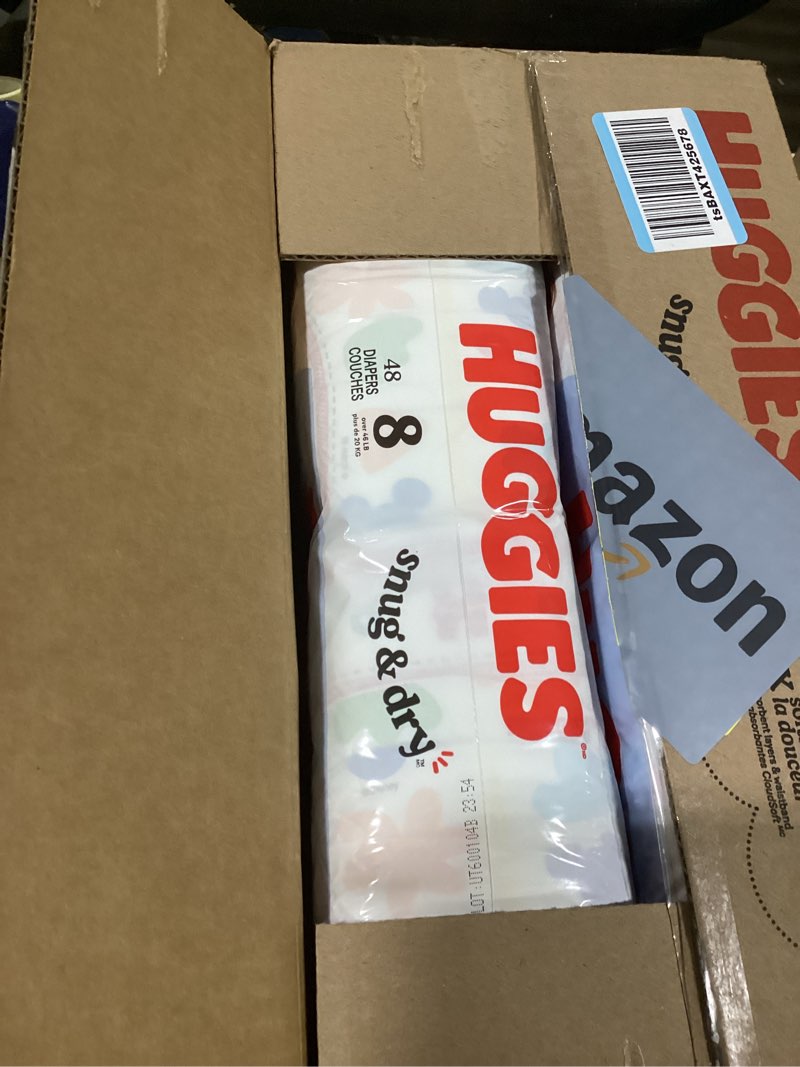 Condition photo showing New/Like New for Huggies Size 8 Diapers, Snug & Dry Baby Diapers, Size 8 (46+ lbs), 96 Count (2 Packs of 48), Packaging May Vary