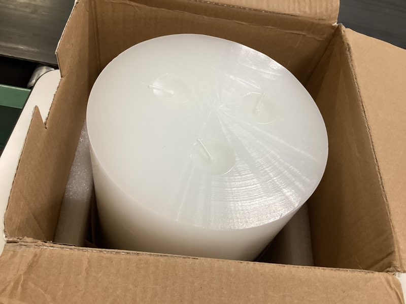 Condition photo showing Good Condition for mozeal extra large 3 wick white pillar candle, 6" x 6", unscented, dripless, smokeless, and clean-burning. approx. 120 hours of burn time. perfect for weddings, dinners, christmas and home decor 6"x6" white