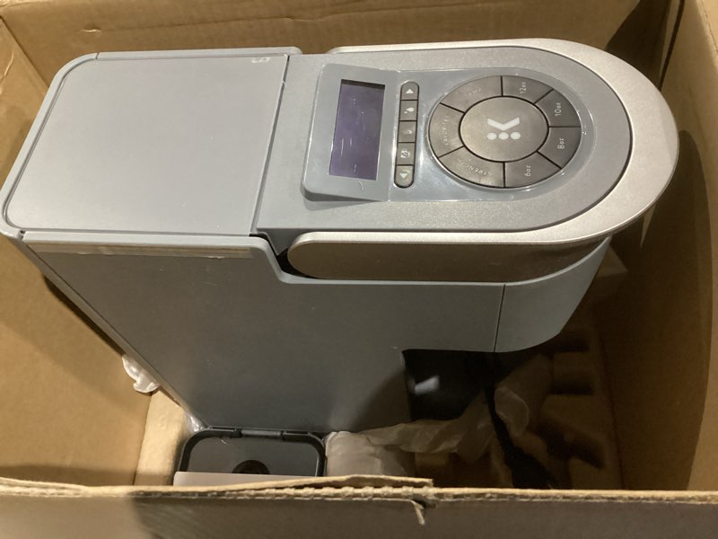 Condition photo showing As Is for keurig k-supreme smart single serve coffee maker with wifi compatibility, 4 brew sizes, and 66oz removable reservoir, compatible with alexa, gray