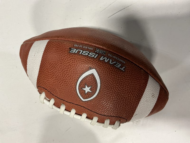 Condition photo showing Good Condition for team issue official pee wee leather football