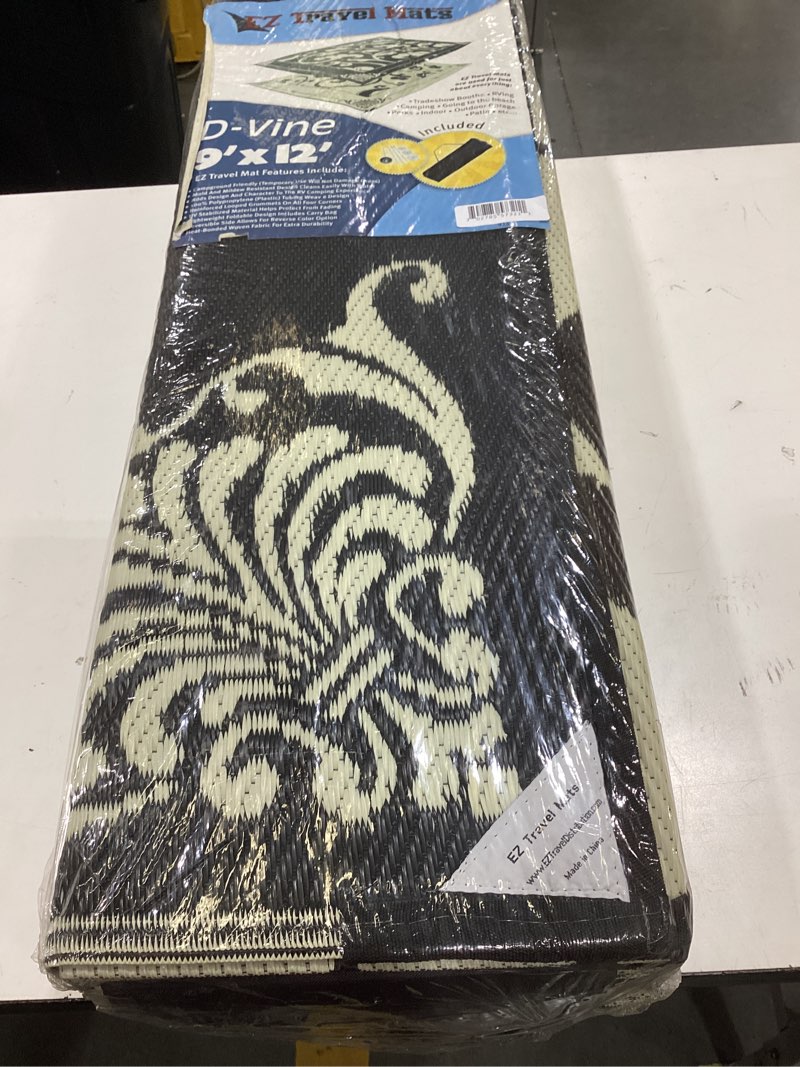 Condition photo showing Good Condition for reversible rv outdoor rug for backyards, beaches, camping grounds, patios, and more, storage bag and mat stakes included, black/beige/d-vine (9x12)