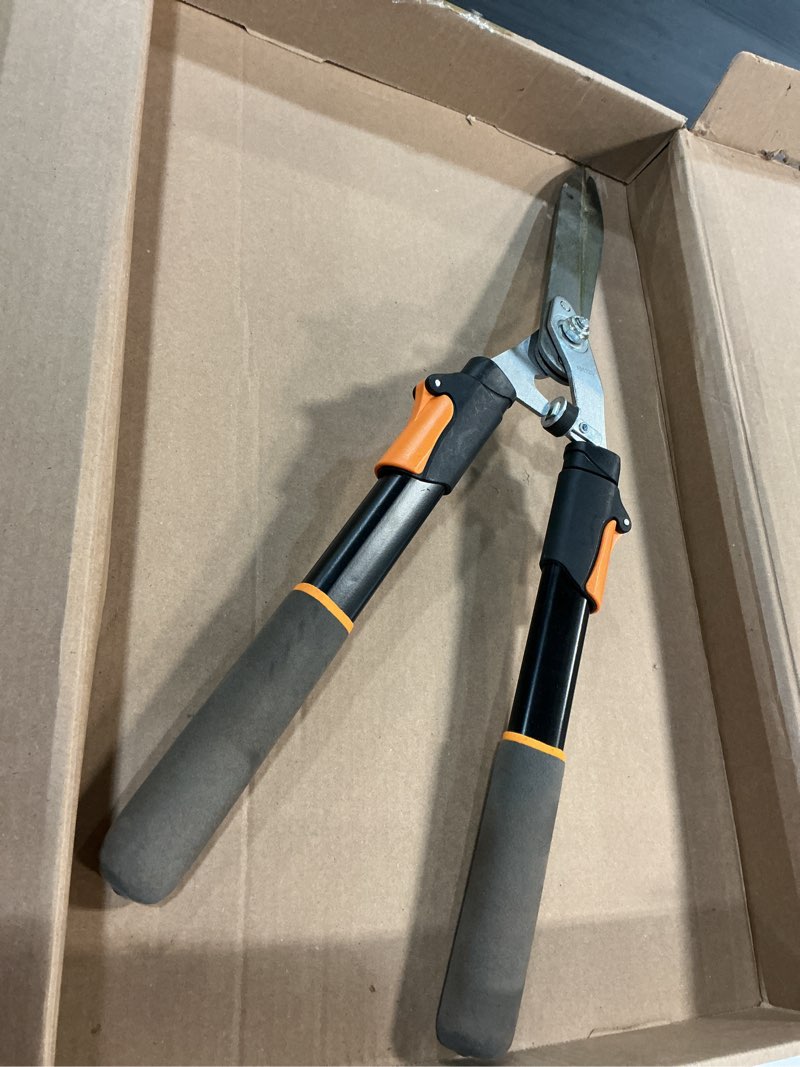 Condition photo showing As Is for fiskars power-lever hedge shears - 25"-33" extendable handle - plant cutting scissors - yard and garden tools - orange/black extendable power-lever with 10" blades