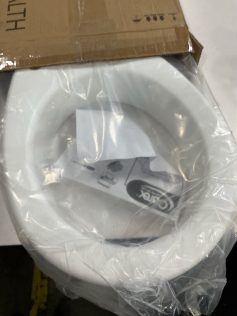 Condition photo showing New/Like New for Carex Toilet Seat Riser, Round Raised Toilet Seat Adds 3.5 inches to Toilet Height, for Assistance B