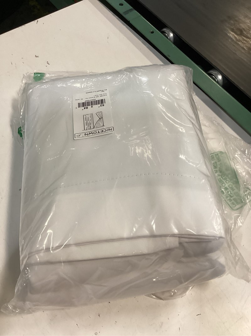 Condition photo showing New/Like New for nicetown 100% blackout curtain panels, rod pocket window curtains with black liner for nursery, 84 inches drop cold and full light blocking draperies (white, 2 pieces, 52 inches wide each panel) 52"w x 84"l (pack of 2) pure white