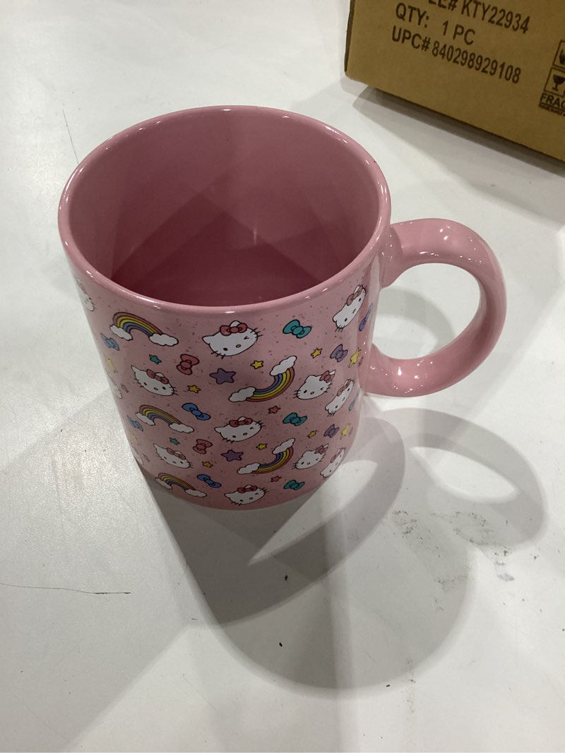 Condition photo showing New/Like New for Silver Buffalo Sanrio Hello Kitty Whimsical Pastel Mug with Stars, Rainbows, and Bows, 20 Ounces