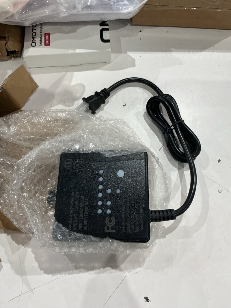 Condition photo showing As Is for dewenwils 60w 120v ac to 12v dc outdoor low voltage transformer with timer and photocell light sensor, weatherproof, specially for led landscape lighting, spotlight, pathway light, etl listed photocell 60w