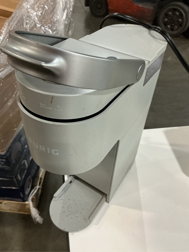 Condition photo showing As Is for Keurig K-Mini Single Serve K-Cup Pod Coffee Maker, 6 to 12oz Brew size, with Cord Storage, Perfect for Small Spaces, Studio Gray