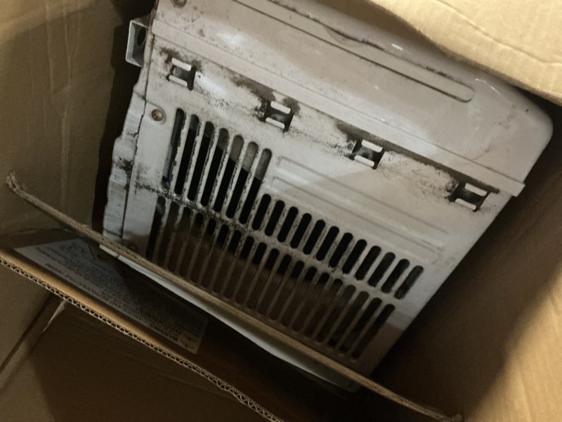 Condition photo showing As Is for amazon basics 5000-btu window air conditioner with quiet operation, up to 150 sqf, cool and fan functions, washable filter, adjustable window kit, intuitive mechanical controls, for small room, white white 5000 btu