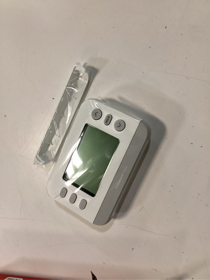 Condition photo showing Good Condition for honeywell home x2p flex schedule heating and cooling push button programmable thermostat