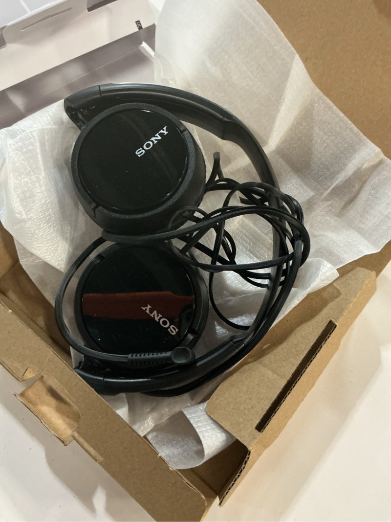 Condition photo showing As Is for zx series stereo headphones in black