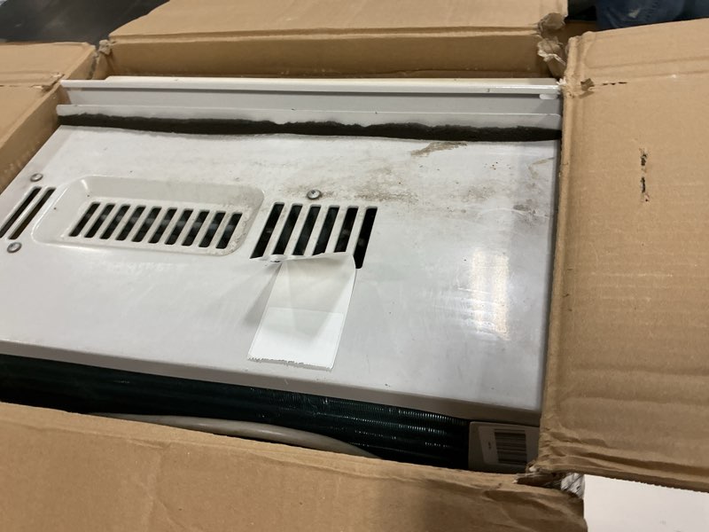 Condition photo showing As Is for ge window air conditioner unit, 5,000 btu for small rooms up to 150 sq ft. with manual adjustable fan and cooling settings, perfect for small bedroom or living room, easy install kit included, white new 5,000 btu mechanical controls white