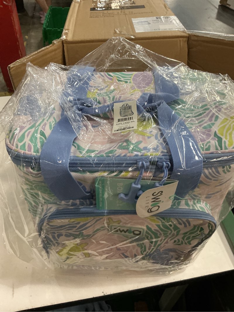 Condition photo showing New/Like New for swig life triple insulated cooler bag with zipper, large travel cooler bag holds 16-24 cans, or 6 wine bottles, insulated sea swirl