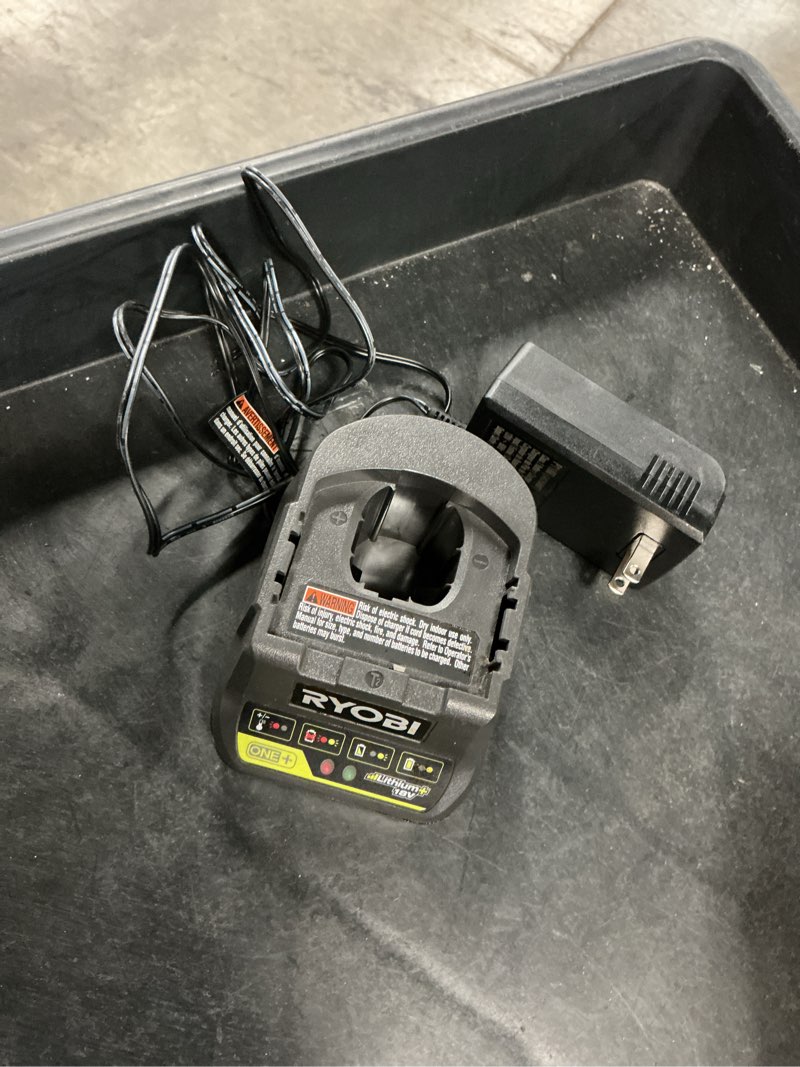 Condition photo showing As Is for ryobi p118b 18v battery charger
