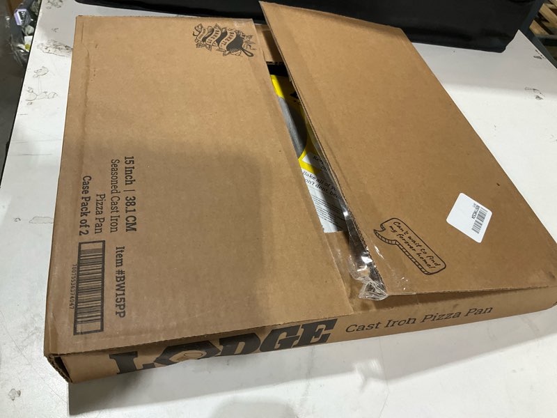 Condition photo showing Good Condition for lodge pre-seasoned cast iron pizza pan, pfas-free, 15 inches | round pizza pan with dual assist handles & even heat distribution, non-toxic & oven safe, made in usa