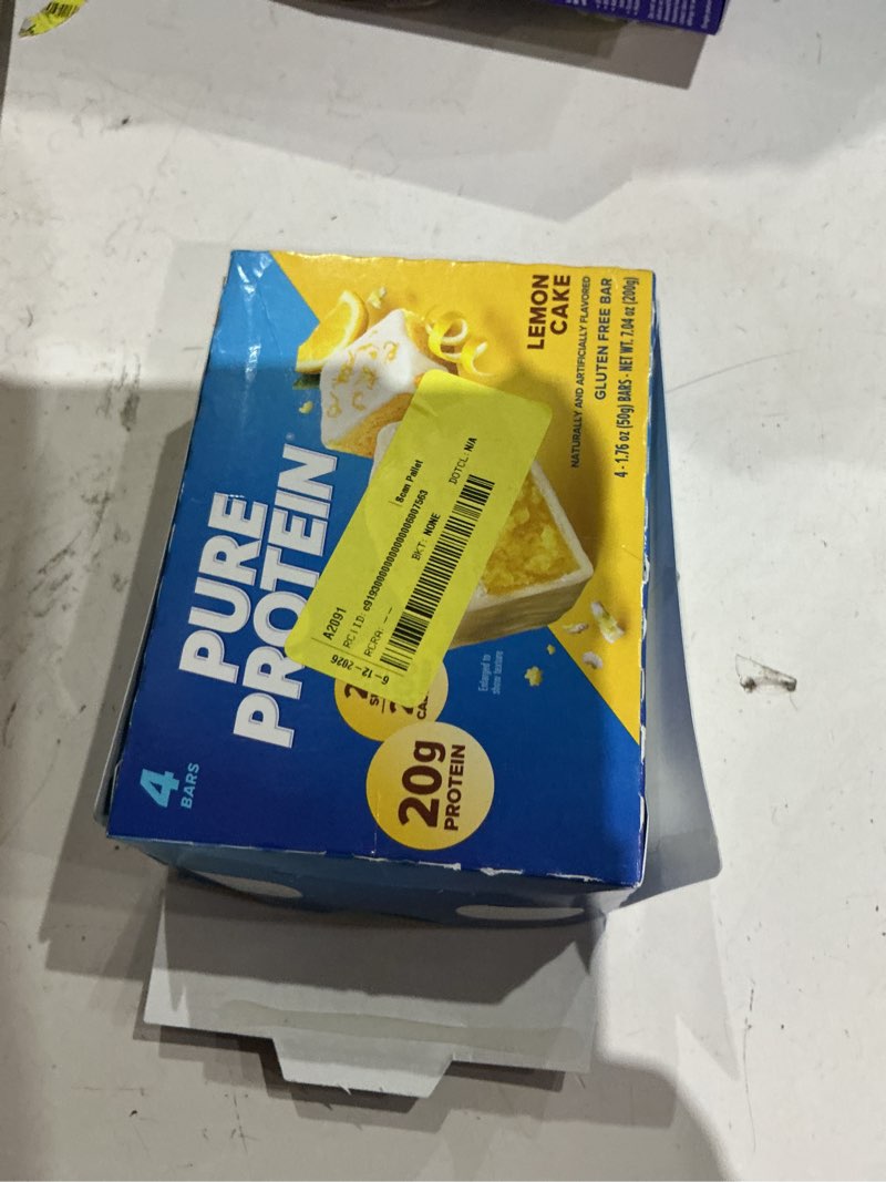 Condition photo showing As Is for pure protein bars, lemon cake, 20g protein, gluten free, 1.76 oz, 4 ct