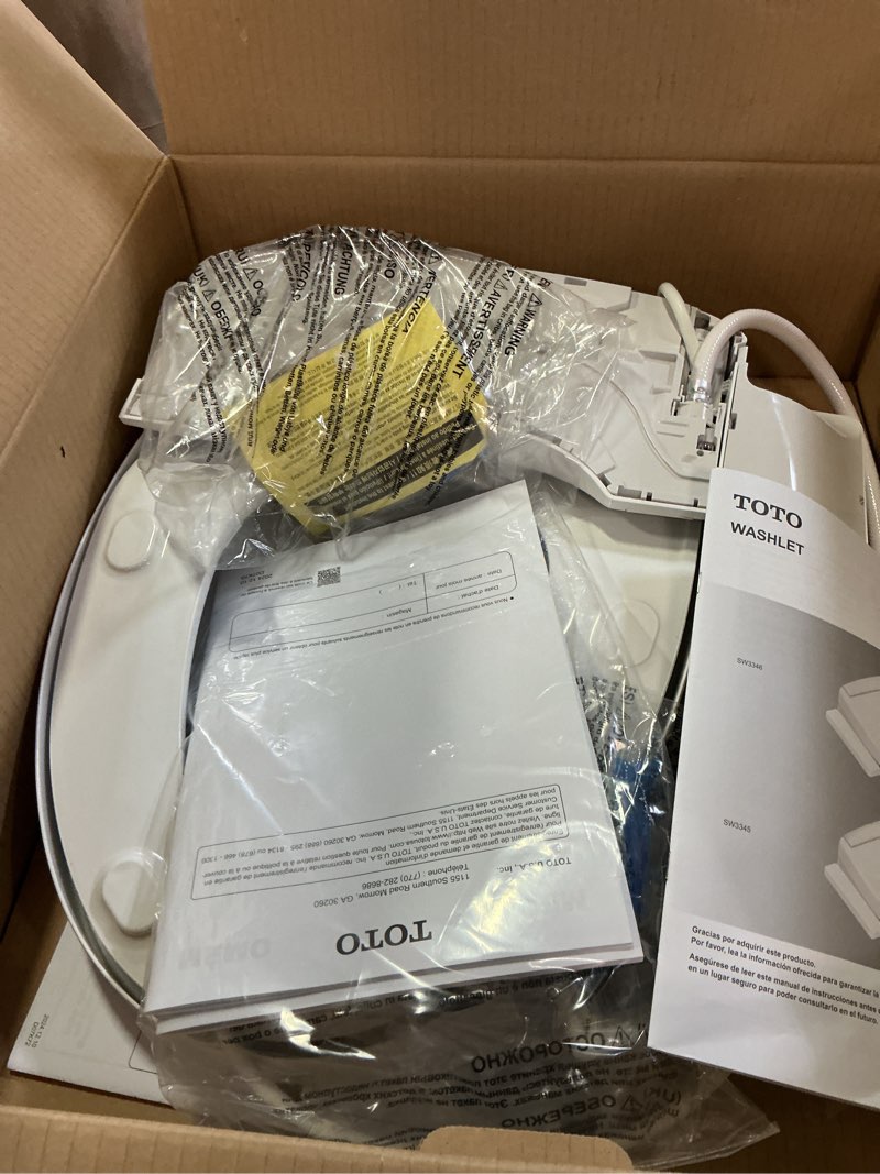 Condition photo showing As Is for toto® washlet® s2 electronic bidet toilet seat with instantaneous water heating, premist and ewater+ wand cleaning, elongated, cotton white - sw3346#01 cotton white elongated contemporary lid