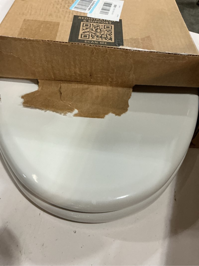 Condition photo showing As Is for mayfair linden slow close toilet seat, non slip heavy duty wood, easy install, elongated, white elongated traditional hinge