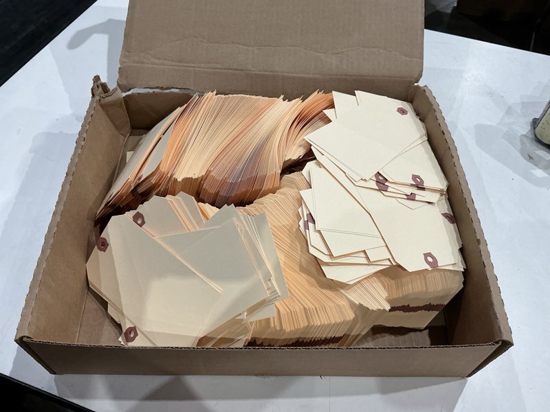 Condition photo showing As Is for aviditi 6 1/4" x 3 1/8" manila shipping tags, 10 pt. reinforced eyelet, to identify or address items that cannot be labeled, case of 1000