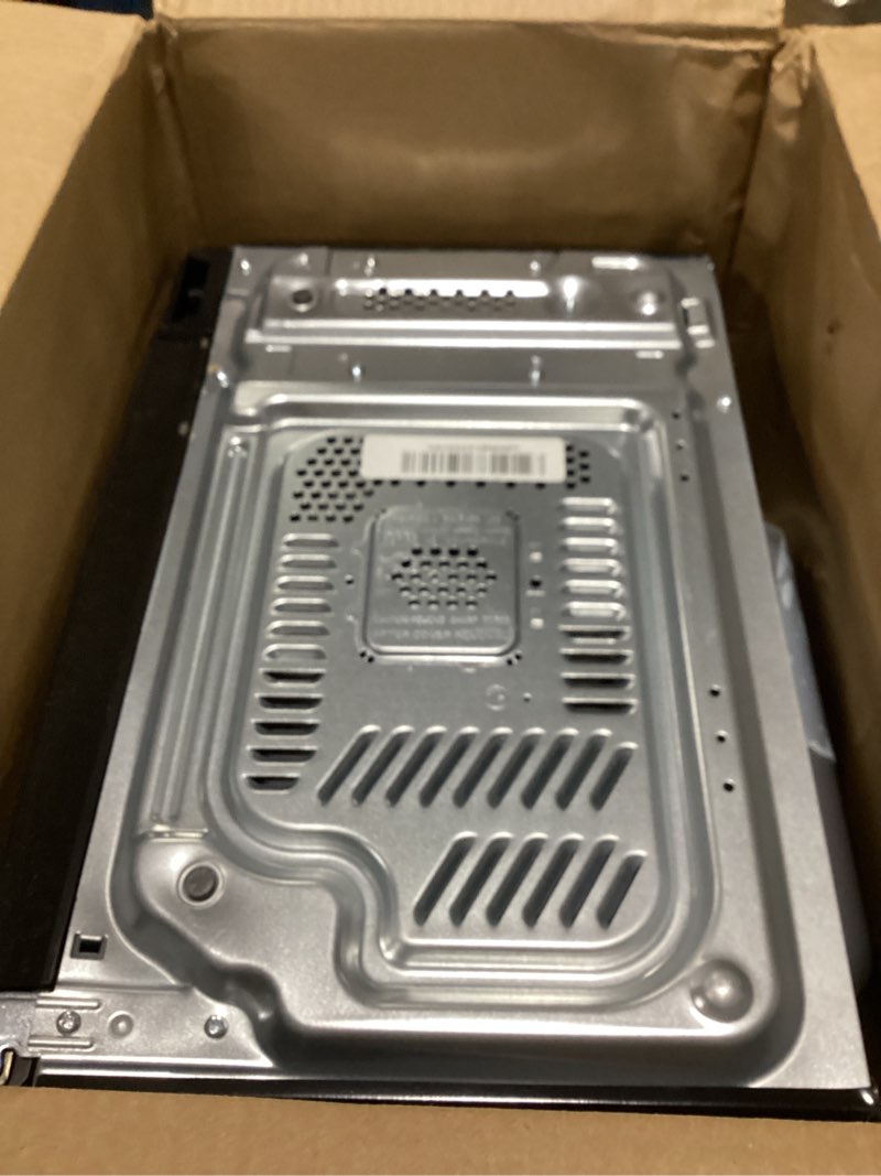 Condition photo showing As Is for Farberware 0.7 Cu. Ft. Countertop Microwave Oven – 700 Watts Power, Auto Cook Settings, Defrost, Easy Clean and Child Safety Lock - Black 0.7 Cu. Ft Black