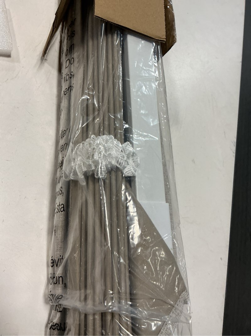 Condition photo showing item condition for LazBlinds No Drill Roman Shades for Windows, Cordless Blackout Window Shades with UV Protection, Polyester Fabric for Bedroom & Living Room, 27" W x 64" H, Beige Blackout - Faux Linen - Beige 27"W x 64"H