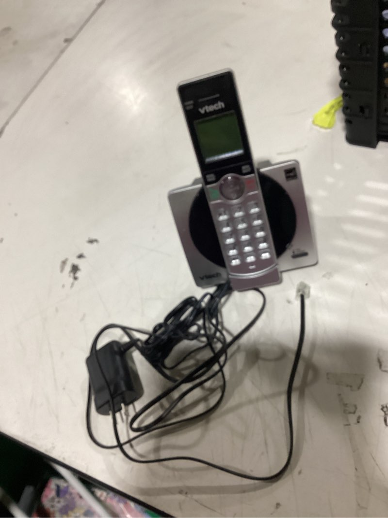 Condition photo showing As Is for vtech dect 6.0 expandable cordless phone with call block, cs6919 (silver & black)