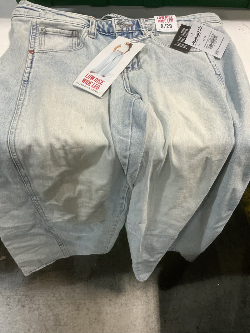 Condition photo showing As Is for celebrity pink women's low rise double waistband wide leg jeans, sizes 9/29