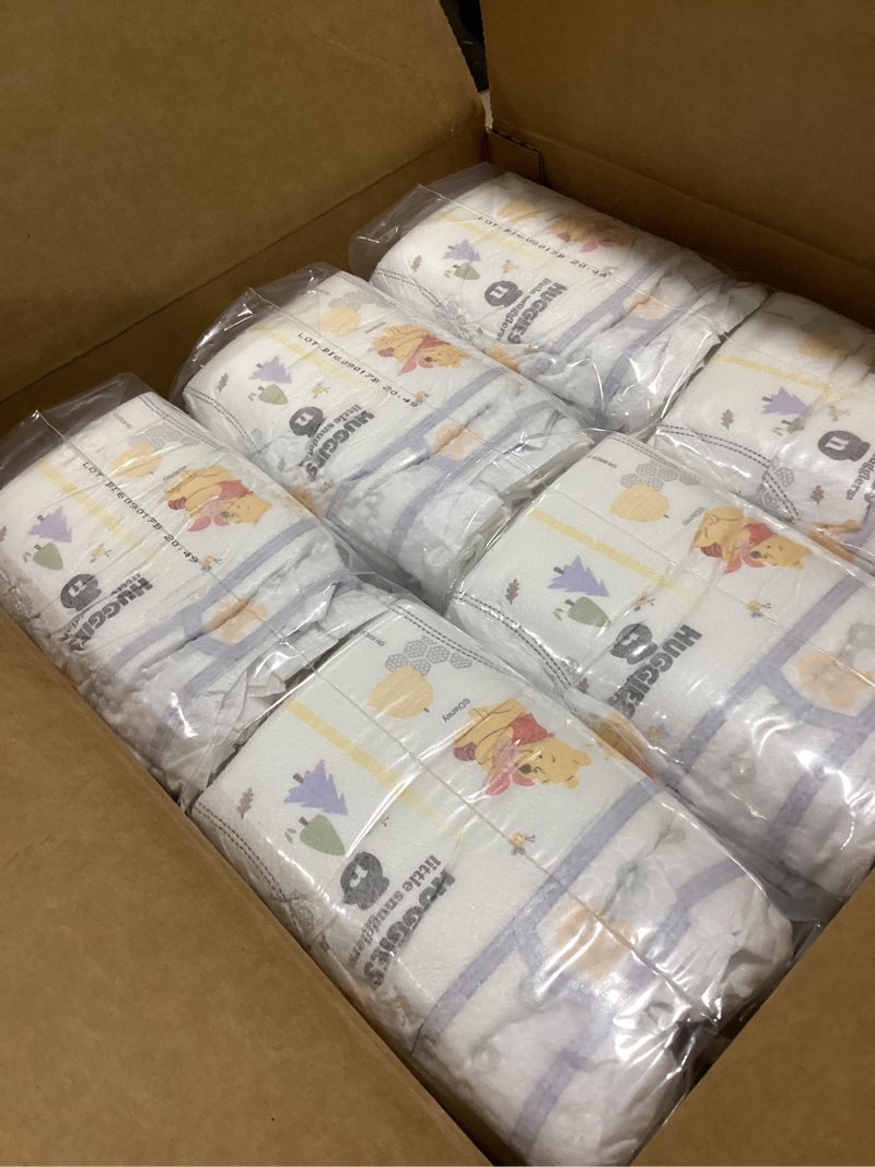 Condition photo showing As Is for huggies size newborn diapers, little snugglers baby diapers, size newborn (up to 10 lbs), 144 count, packaging may vary