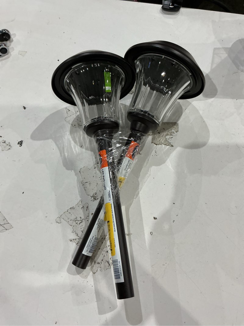 Condition photo showing As Is for 2pack))))harbor breeze 15 -lumens 0.15 -watt oil-rubbed bronze solar led outdoor path light ( 3000-k )