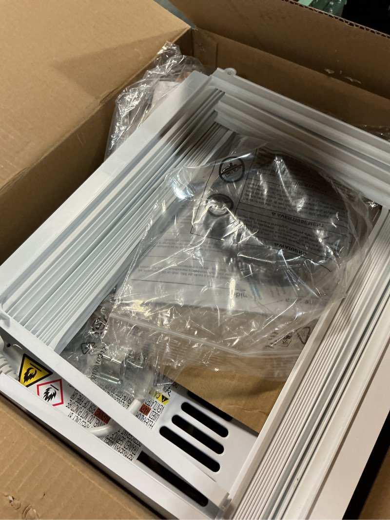Condition photo showing As Is for ge appliances 5000 btu mechanical window air conditioner unit
