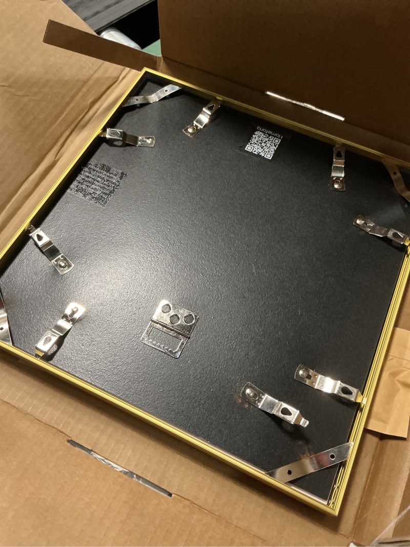 Condition photo showing As Is for Homeforia 11x11 Picture Frame Gold, High End Metal 11 by 11 Square Frames with Mat 9 x 9 Photo, 11by11 Thin Poster Frame Matted to 9x9 inch Art, Wall Hanging Frames, Tempered Glass, Wall Kit, Set of 1