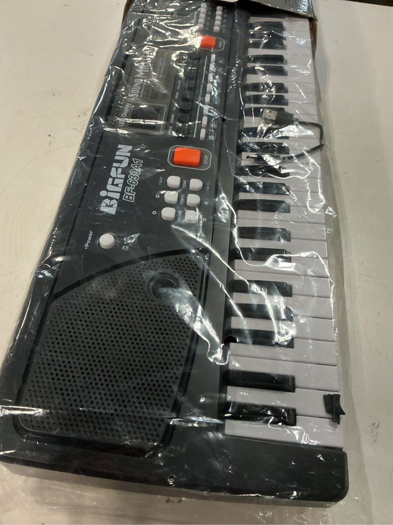 Condition photo showing Good Condition for raimy piano keyboard for beginners, 61 keys portable electronic digital piano with microphone, learning educational music keyboard piano for kids gifts toys for boys girls toddlers (black)