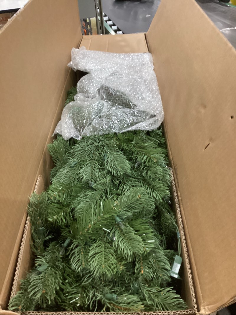 Condition photo showing As Is for National Tree Company 4.5 ft Pre-Lit Downswept Douglas Fir Artificial Christmas Tree, 450 Clear Lights, 525 Tips, Includes Stand, Green 4ft 6in Christmas Tree