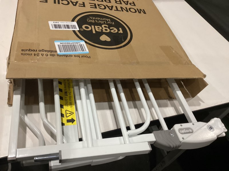 Condition photo showing Good Condition for Regalo Safety 38" Baby Gate for Doorways & Bottom of Stairs, Pressure Mount Design for Babies, Toddlers & Pets, Tested & Safe for 30 Years, American Designed, American Owned, White White 29-38.5"W x 30"H