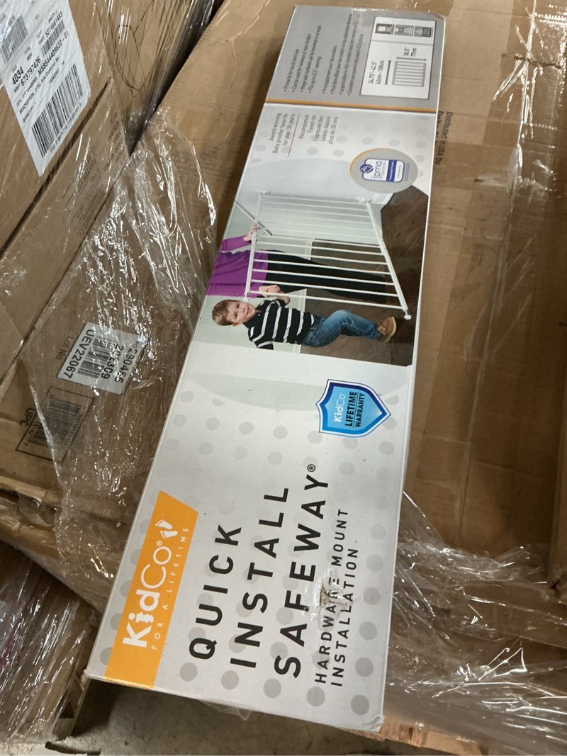 Condition photo showing New/Like New for kidco quick install safeway top of stairs quick release baby gate for blocking stairs or hallways and dividing rooms, 42.5 x 28.75 inches, steel, white