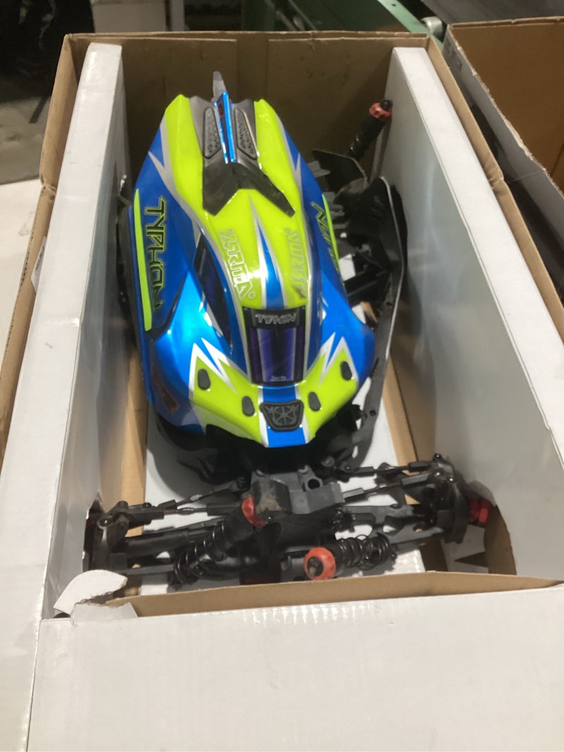 Condition photo showing As Is for arrma rc car 1/8 typhon 6s v5 4wd blx buggy with spektrum firma rtr (ready-to-run), black and red, ara8606v5