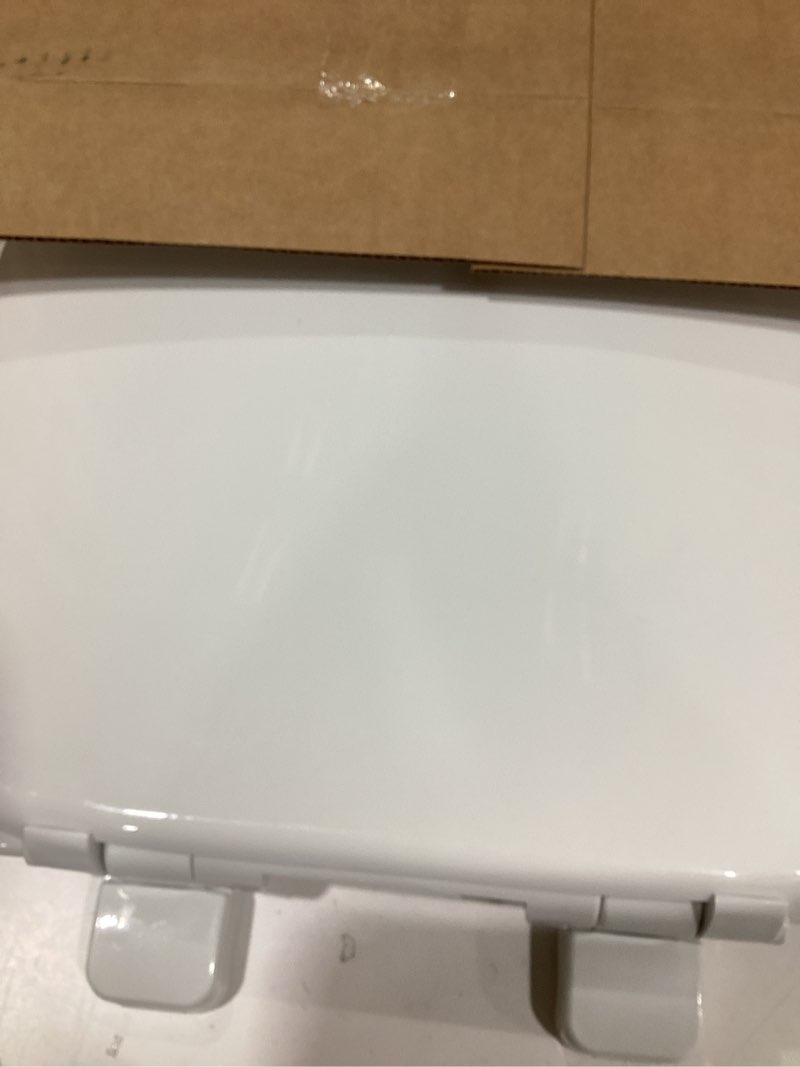 Condition photo showing New/Like New for american standard 5503b00b.020 transitional slow-close round front toilet seat, white modern