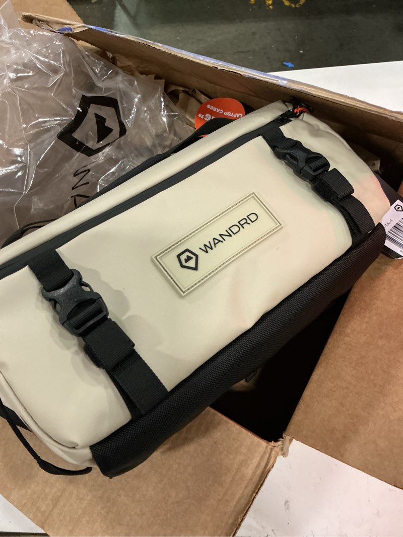 Condition photo showing Good Condition for wandrd rogue v1 9l sling: compact camera sling and crossbody bag with fast access, 3-way carry– lightweight everyday bag great for travel, photography, and daily use (yuma tan) yuma tan 9l