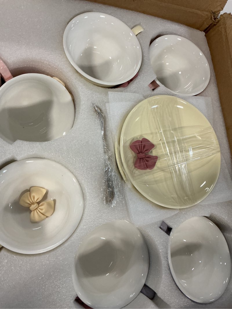Condition photo showing Good Condition for ichag tea cups and saucers set, tea cups set of 6,18-piece 8oz vintage porcelain teacup and saucer set with golden spoon and bowknot, coffee cup set for women's tea party, home office gifts 6 bowknot