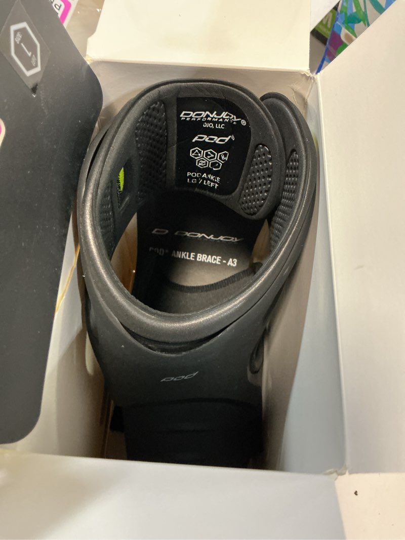 Condition photo showing New/Like New for pod® ankle support - black - large - left