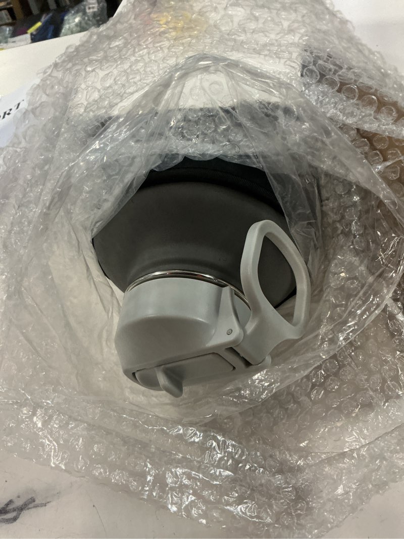 Condition photo showing New/Like New for half gallon water bottle insulated with straw & 3 lids, coolflask 64 oz water jug large metal stainless steel wide mouth for sports, gym or office, non-bpa keep cold 48h hot 24h, dark grey 64 ounces dark gray