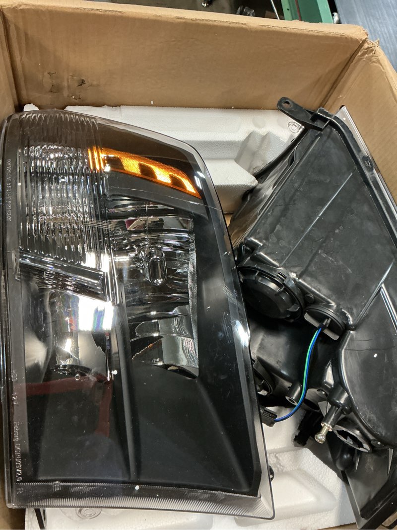 Condition photo showing Good Condition for sockir headlight assembly compatible with 2009-2018 dodge ram 1500 | for 2010-2018 dodge ram 2500 3500 oe quad pickup replacement halogen headlamp driver and passenger side black housing black housing with amber reflector w/o bulbs