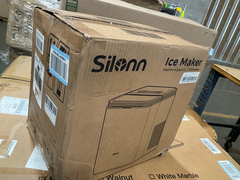 Condition photo showing As Is for silonn ice maker countertop, 8 ice cubes in 6 mins, 26.5 lbs/24h, 2 bullet ice sizes, self-cleaning bullet ice maker, portable ice machine for kitchen, party, office, and rv camping ebony 26.5 lbs