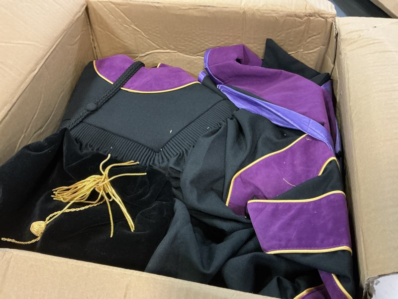 Condition photo showing Good Condition for unisex deluxe doctoral graduation gown, graduation hood and 8 sided doctoral tam package 45 purple